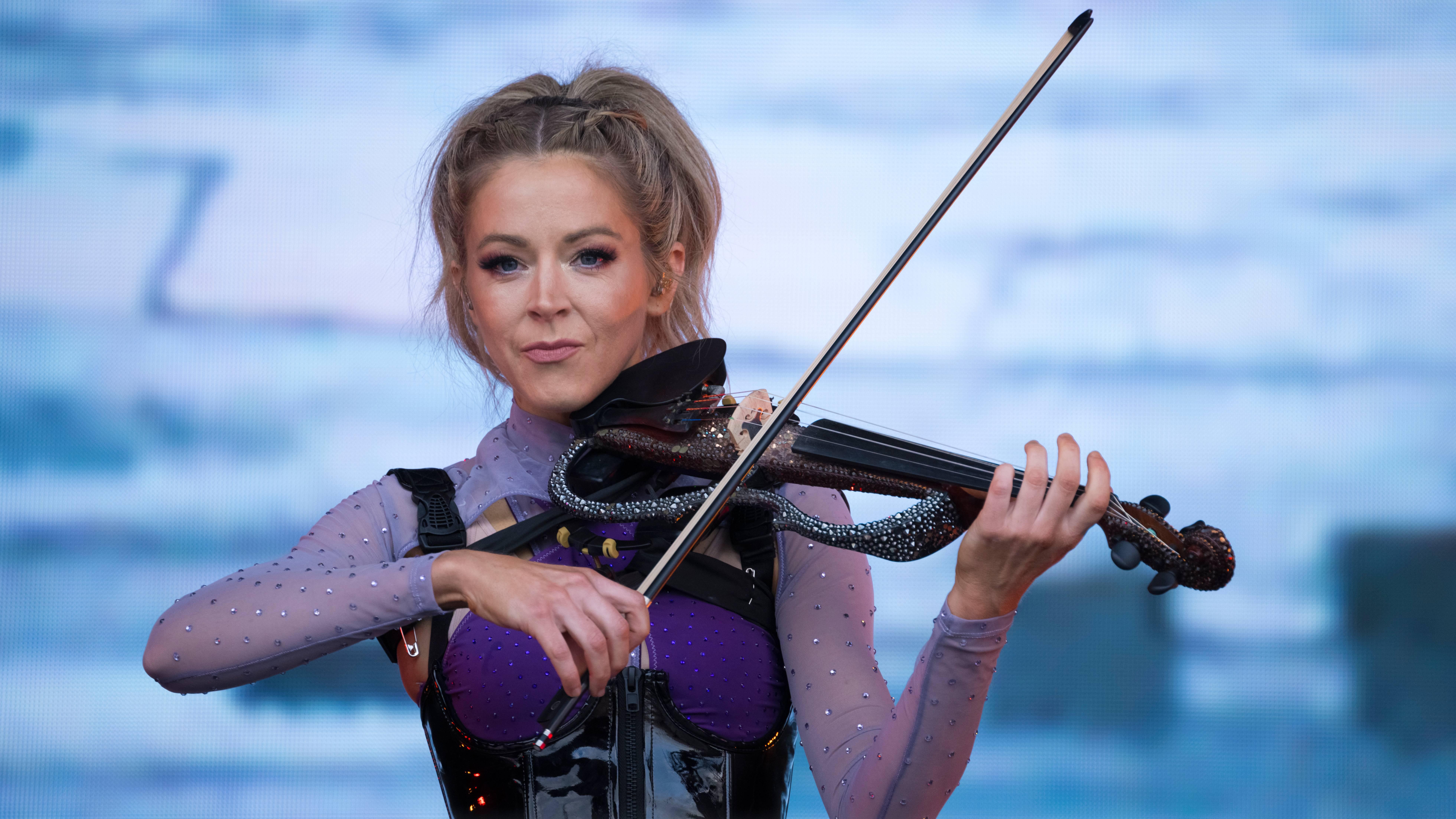 Lindsey Stirling performing on tour